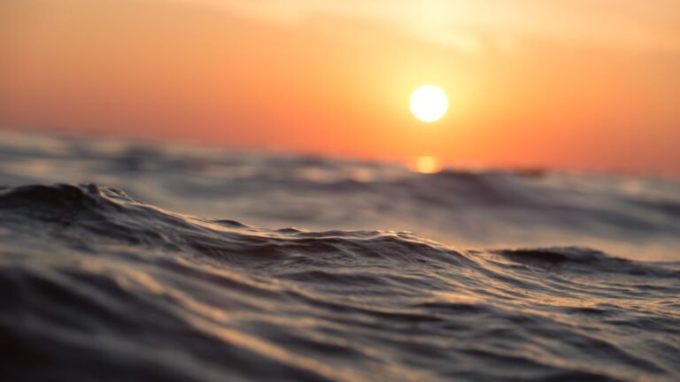 Landal-app en digitale sleutel - zonsondergang boven zee